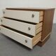 Low chest of drawers with 3 drawers in mahogany and white satin, France circa 1980.