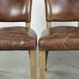 Set of 4 vintage cowhide and wooden dining chairs