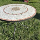 Iron table with ceramic top