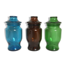 3 blue-green brown glass jars