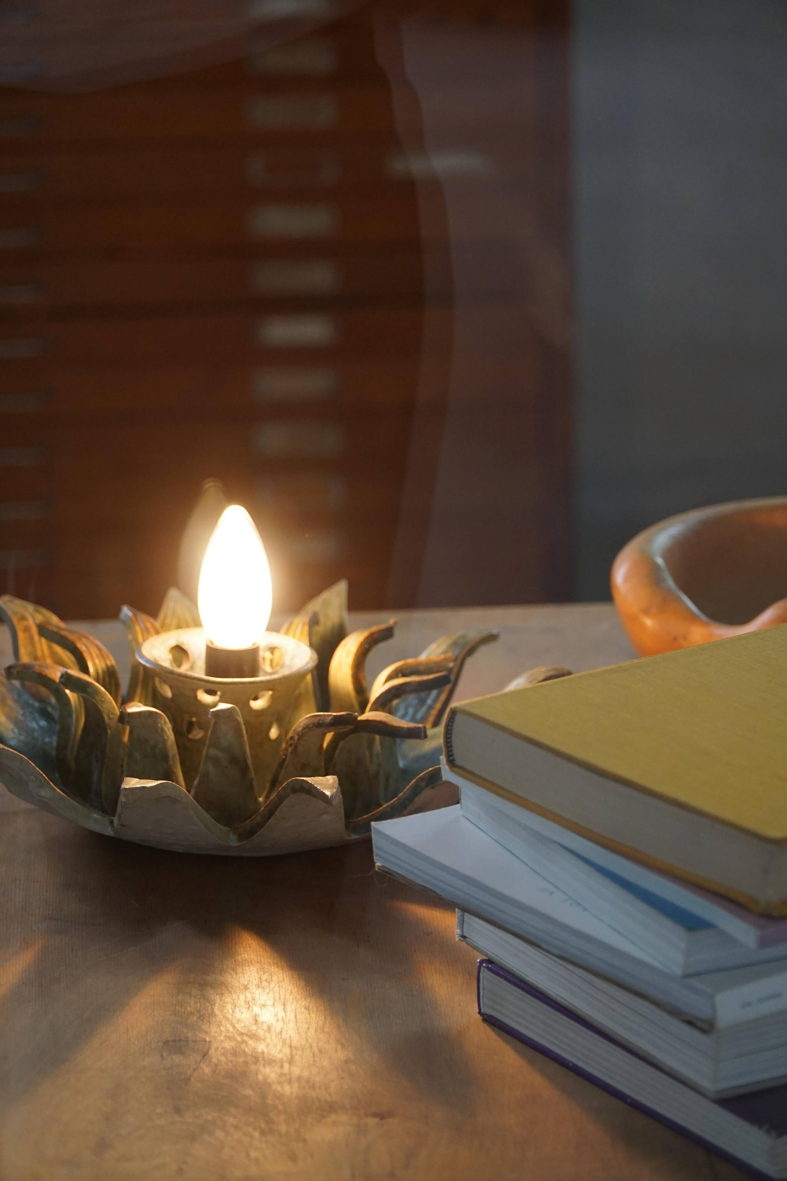 Mid-20th century ceramic sun wall lamp or decorative wall sculpture, 1960s.