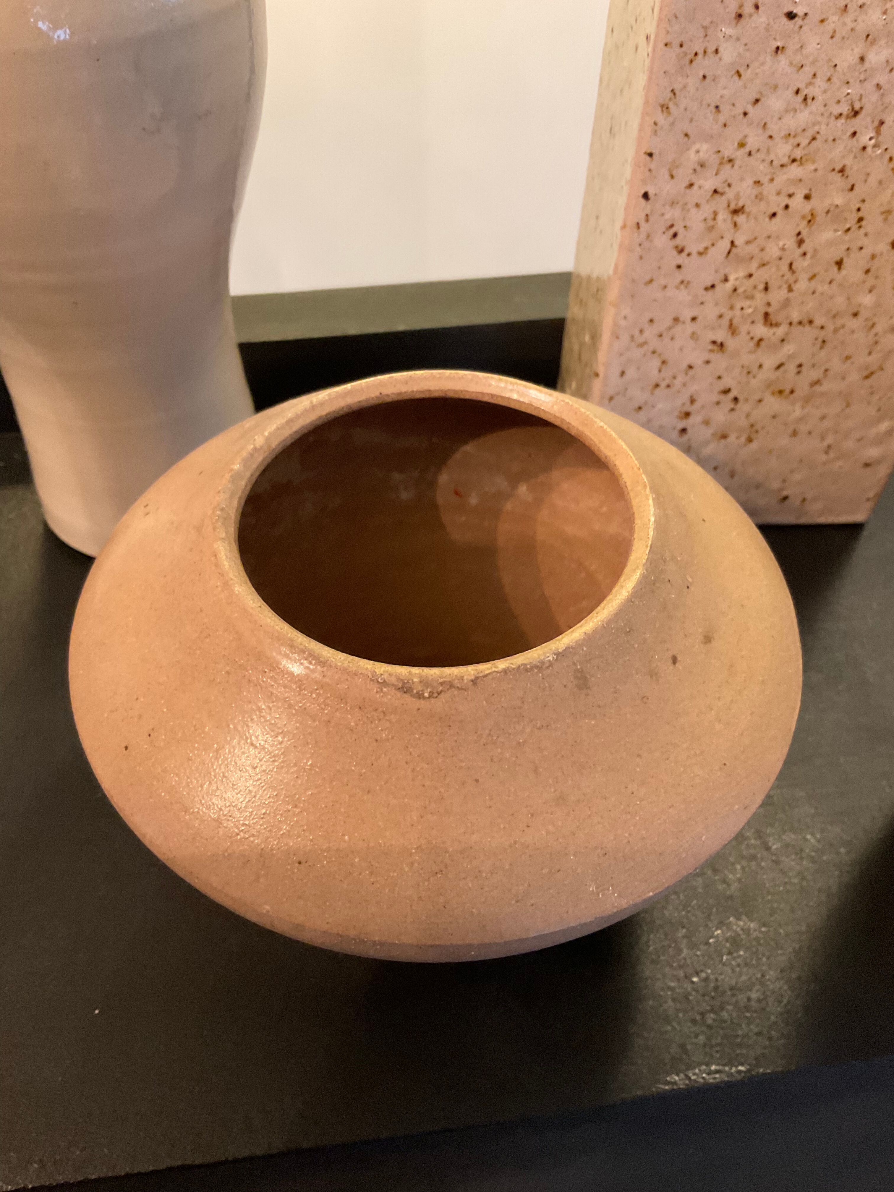 Series of 5 vintage beige ceramic vases