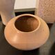 Series of 5 vintage beige ceramic vases