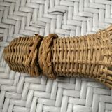 Wicker-sheathed glass bottle