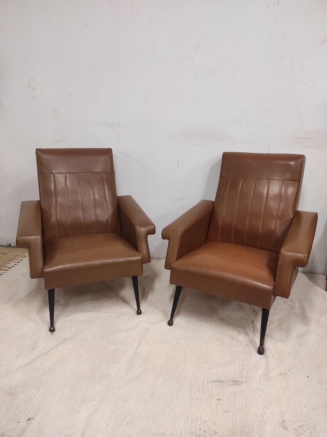 Pair of vintage leatherette armchairs