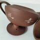 Japanese teapot in red clay engraved with integrated filter.