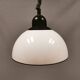 Hanging lamp, in milky white plastic with black top/suspension, probably Danish.