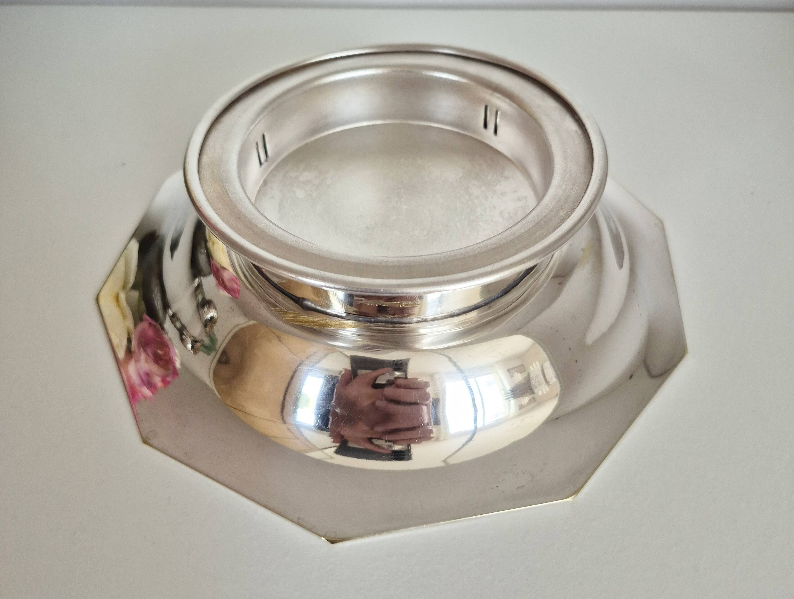 Antique butter dish in the Coquillor style, made of silver-plated metal.