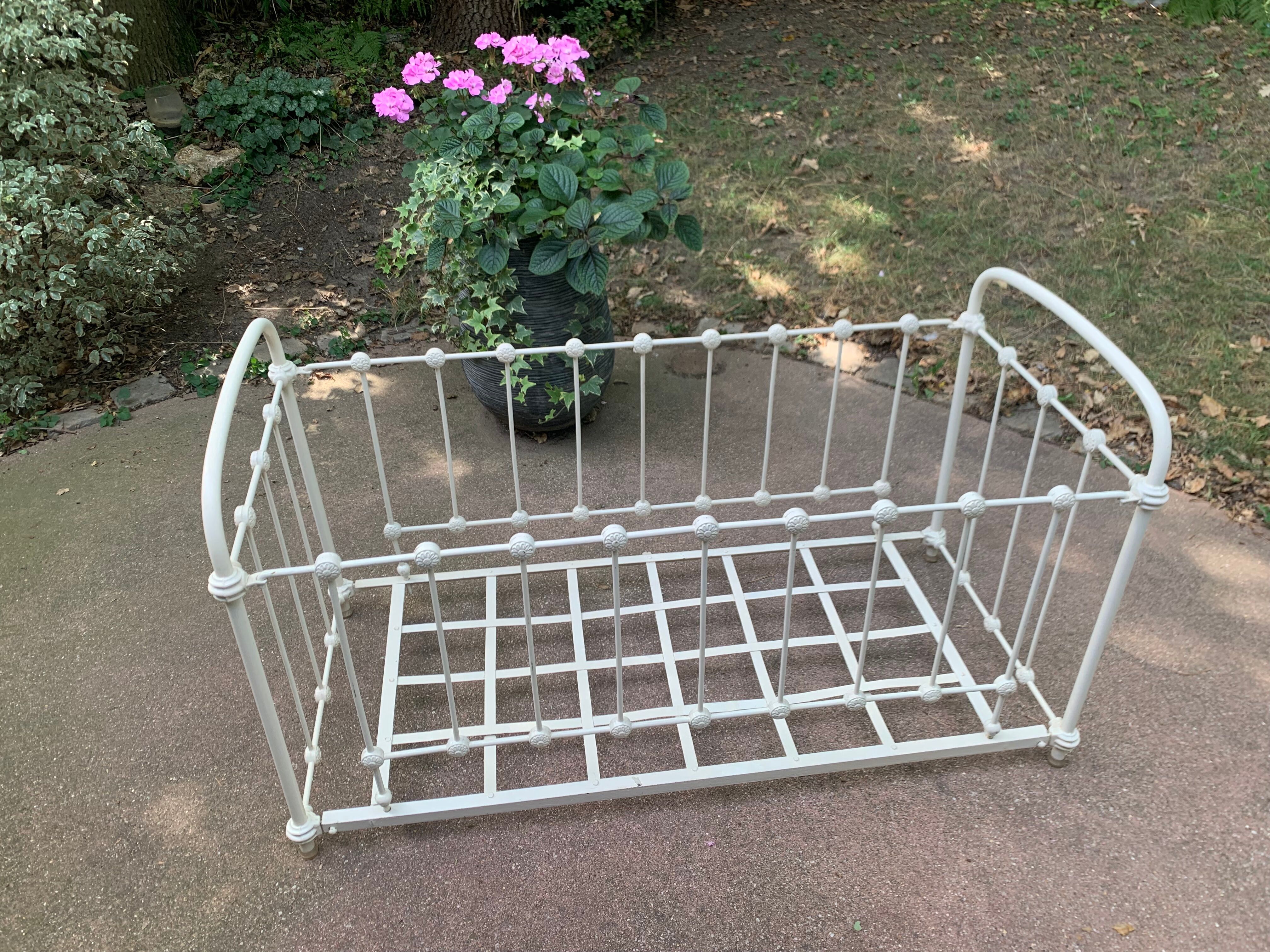 Wrought iron sofa bed with box spring.