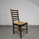 Ensemble de 4 chaises de salle à manger en chêne, rustiques, de ferme, à dossier en échelle avec sièges en jonc, années 1960