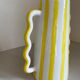 Lemon yellow and white striped ceramic vase with abstract wavy handmade handheld