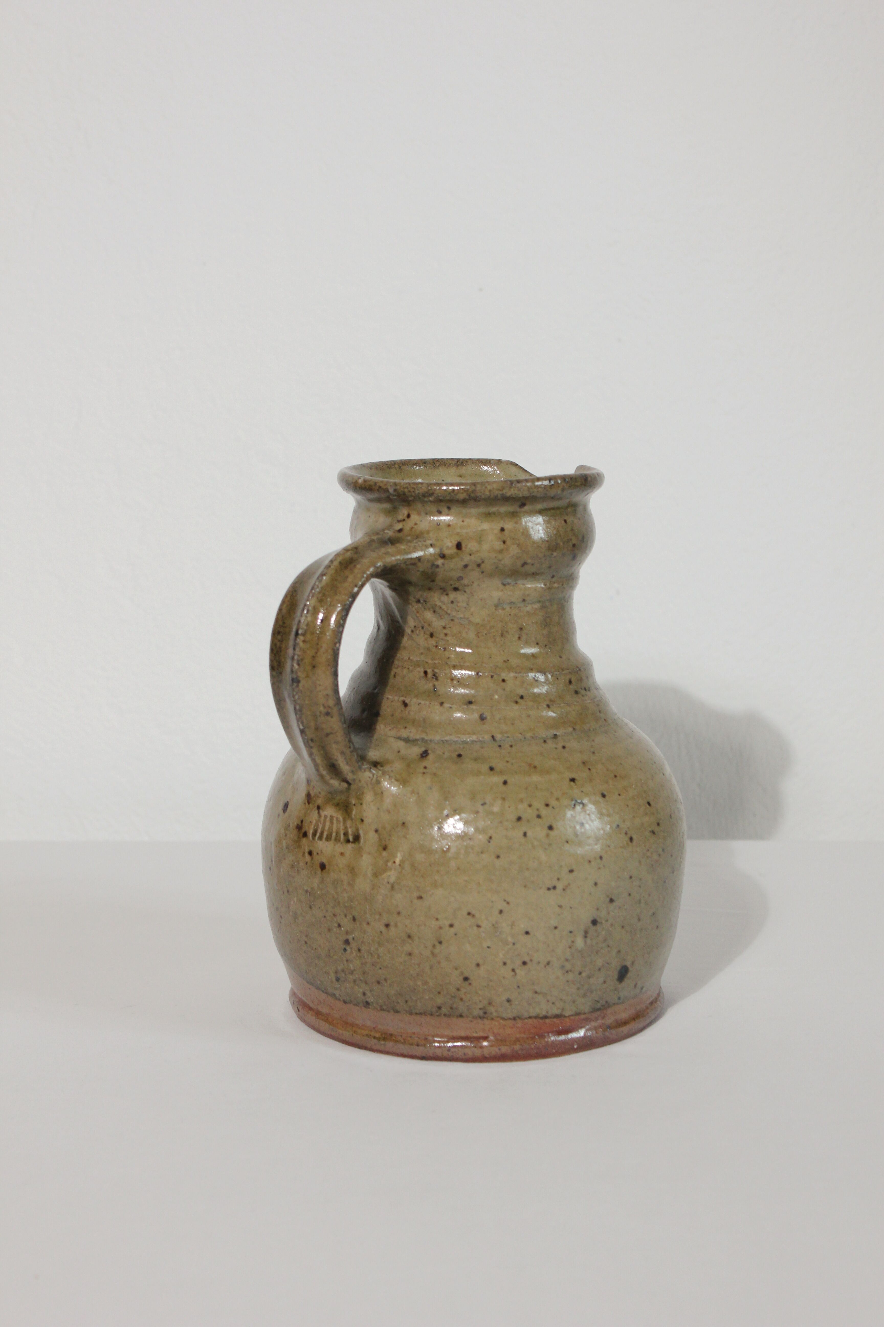 Vintage handcrafted stoneware jug/pitcher