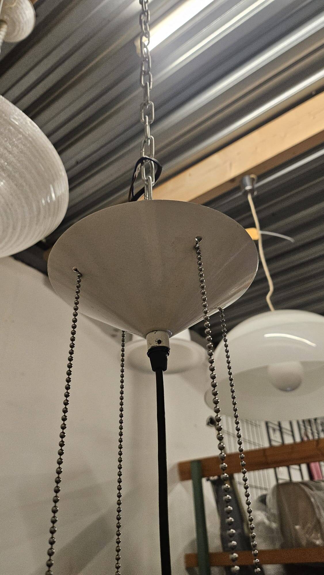 Black plexiglass pendant lamp from the 1980s, mounted on chains, originating from Italy.