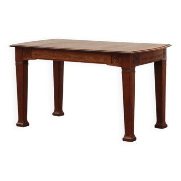 Oak Art Deco dining table with carved frieze, France 1920s