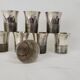 Cocktail shaker service & cups in silver metal