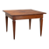 Antique Directoire table in walnut and cherry, Italy, 19th century.