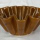 Ocher ceramic cake dish