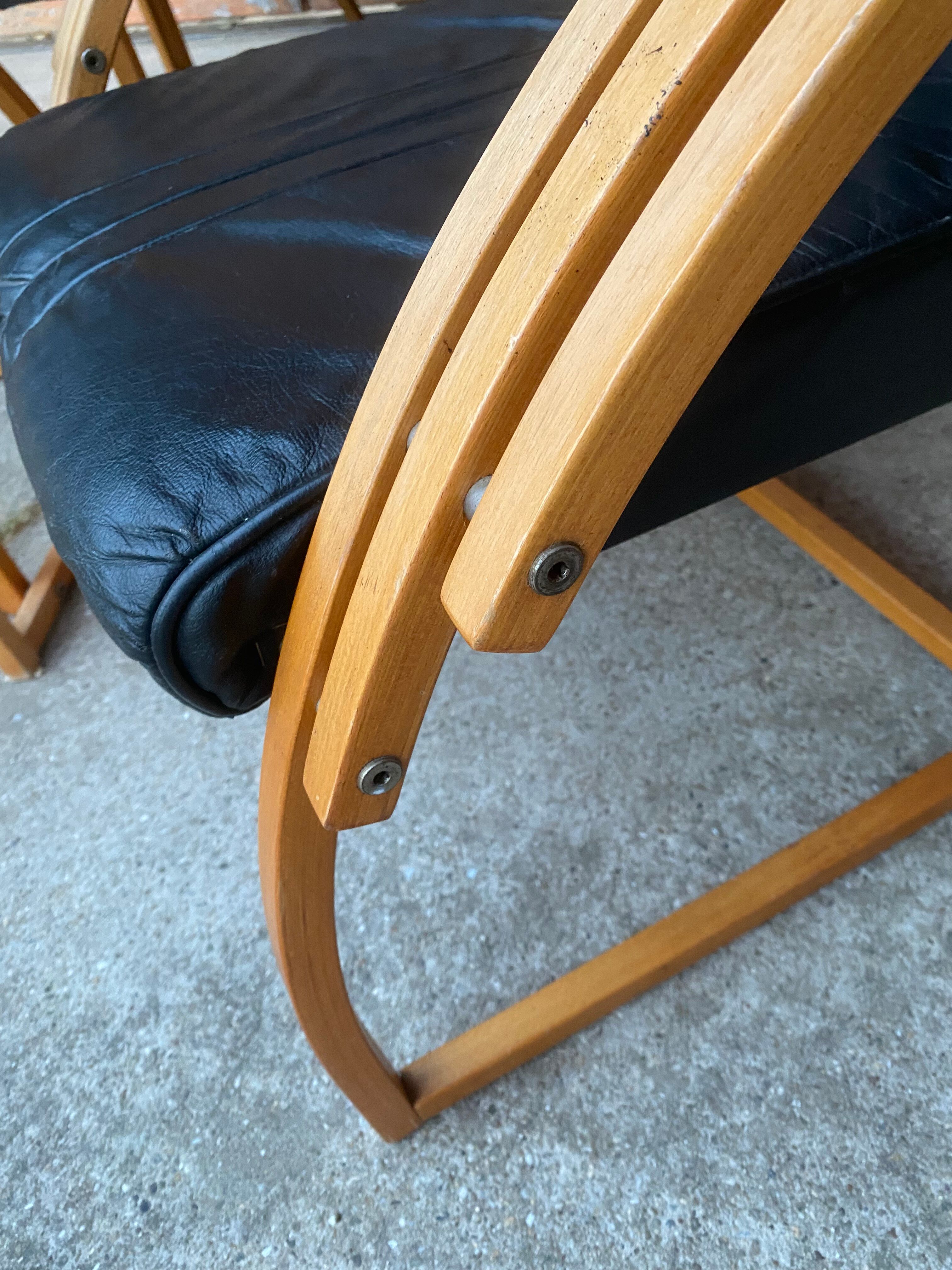 Mid-century leather sofa, 2 fotels, and table in sett