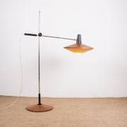 Large tilting floor lamp in steel and teak by Georges Frydman 1960.