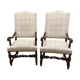 Paire de fauteuils en bois mouluré de style Louis XIII