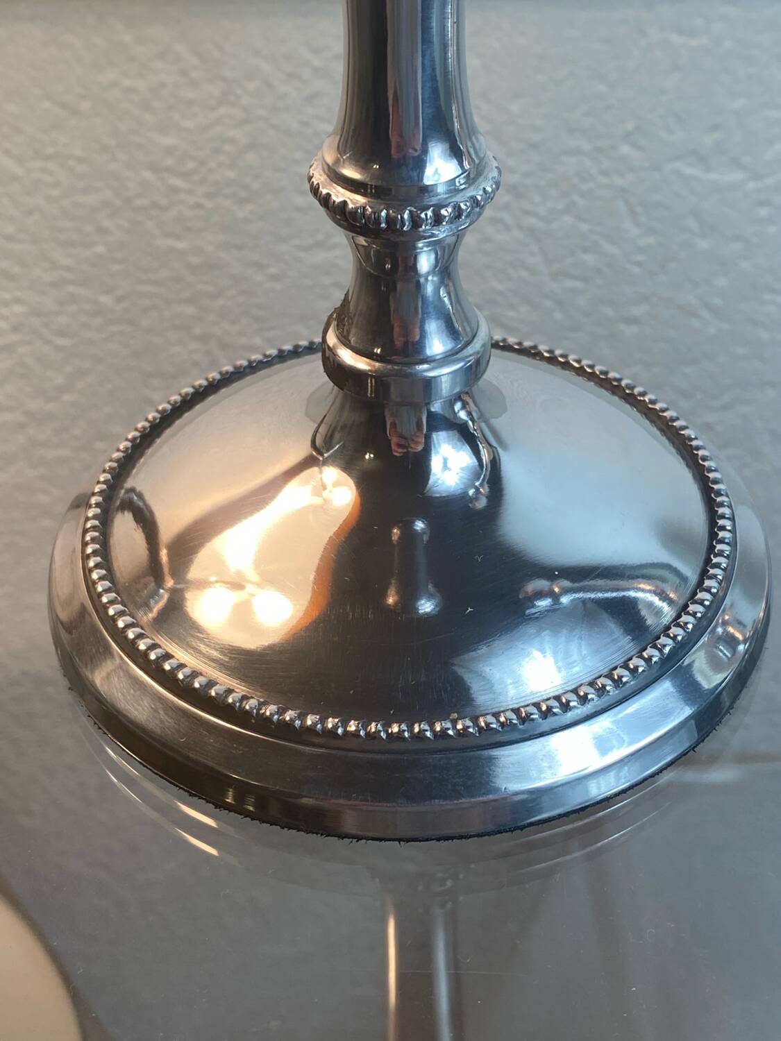 Pair of silver-plated metal candlesticks