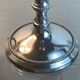 Pair of silver-plated metal candlesticks