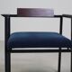 Pair of Postmodern armchairs in steel and mahogany, 1970s