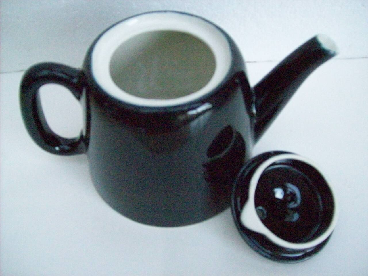 Vintage black ceramic teapot