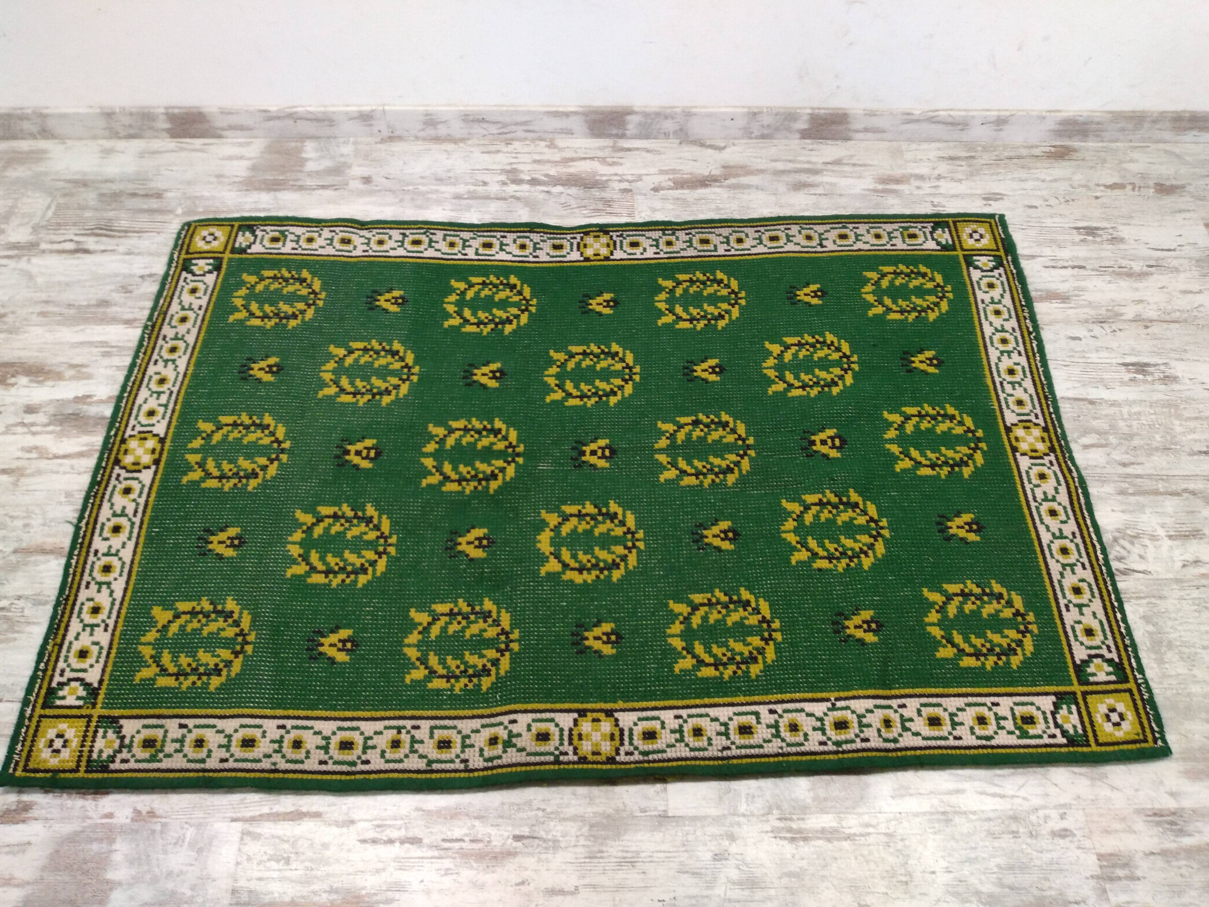Antique green Berber rug