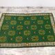 Antique green Berber rug