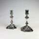 Pair of antique candlesticks in silver metal