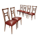 Set of six 1950s chairs with burgundy seats.