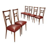 Set of six 1950s chairs with burgundy seats.