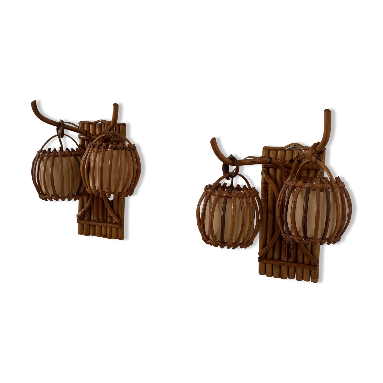 Vintage pair of rattan wall lights, France, 1950.