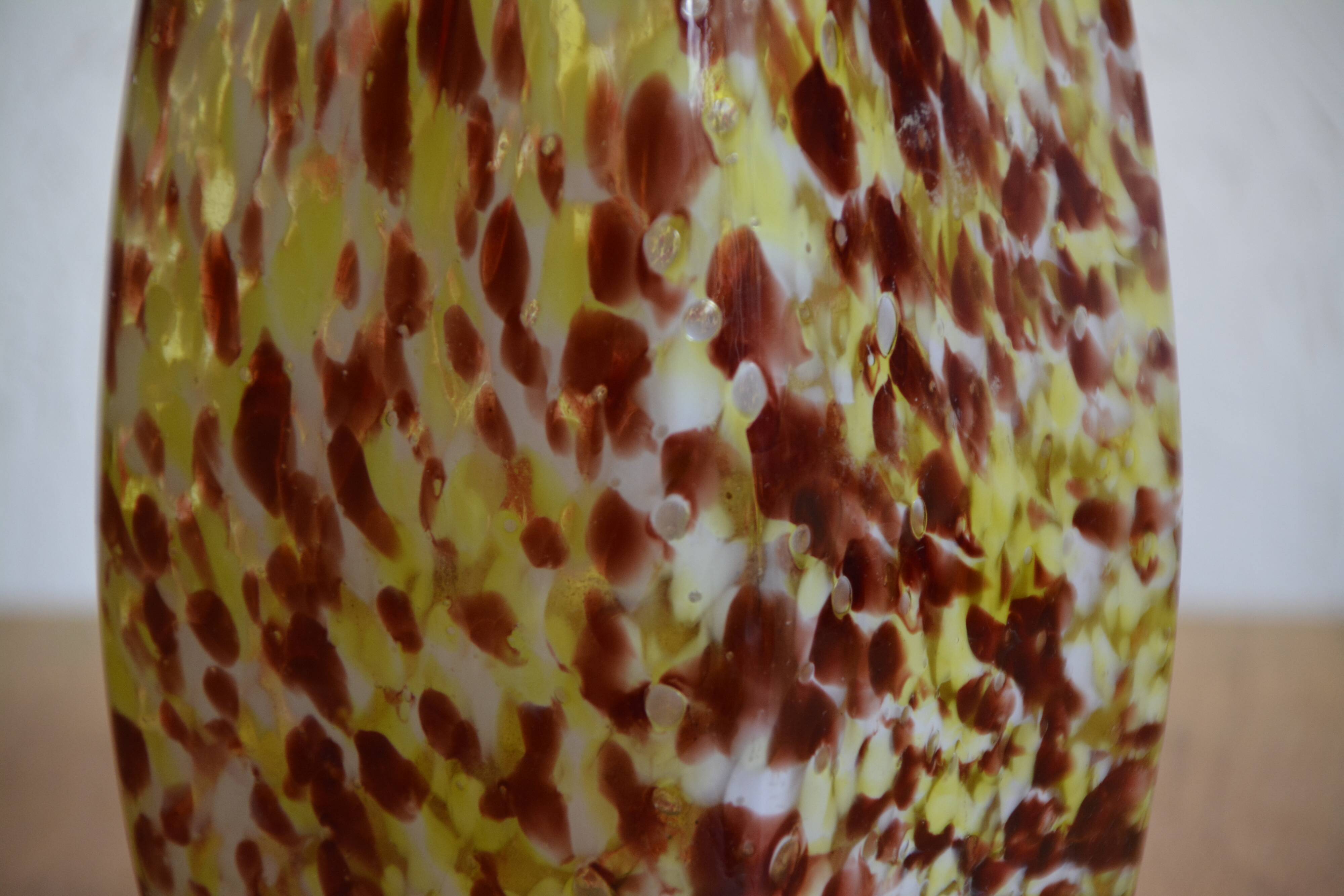 Yellow and white speckled decanter