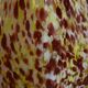 Yellow and white speckled decanter