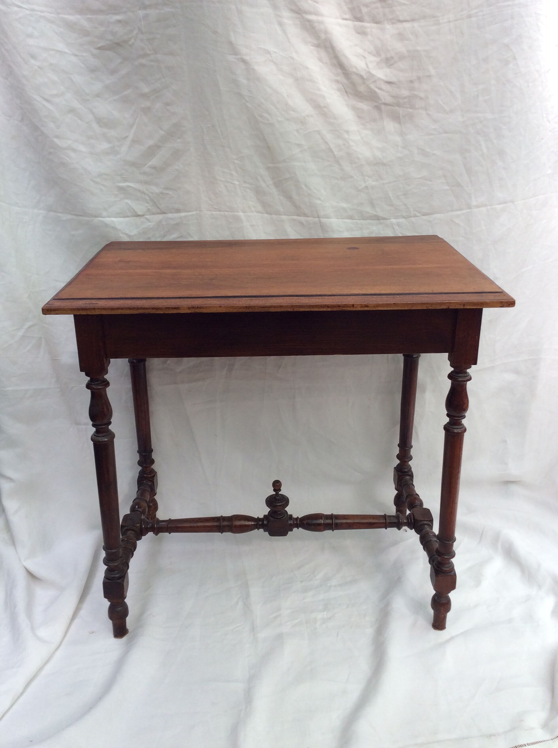 Old wooden table with drawer