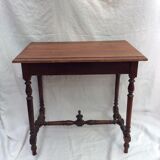 Old wooden table with drawer