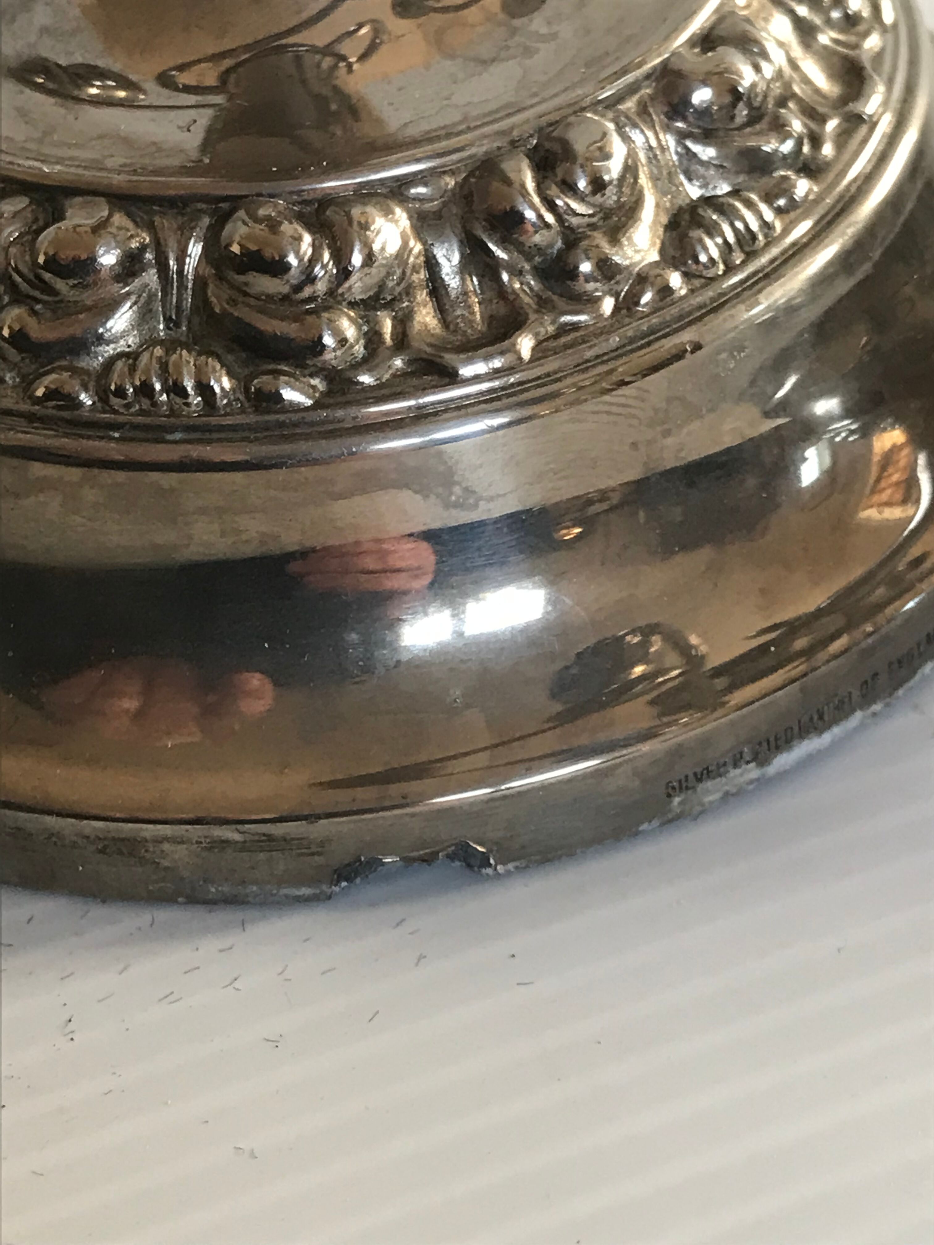 Pair of silver metal chandeliers