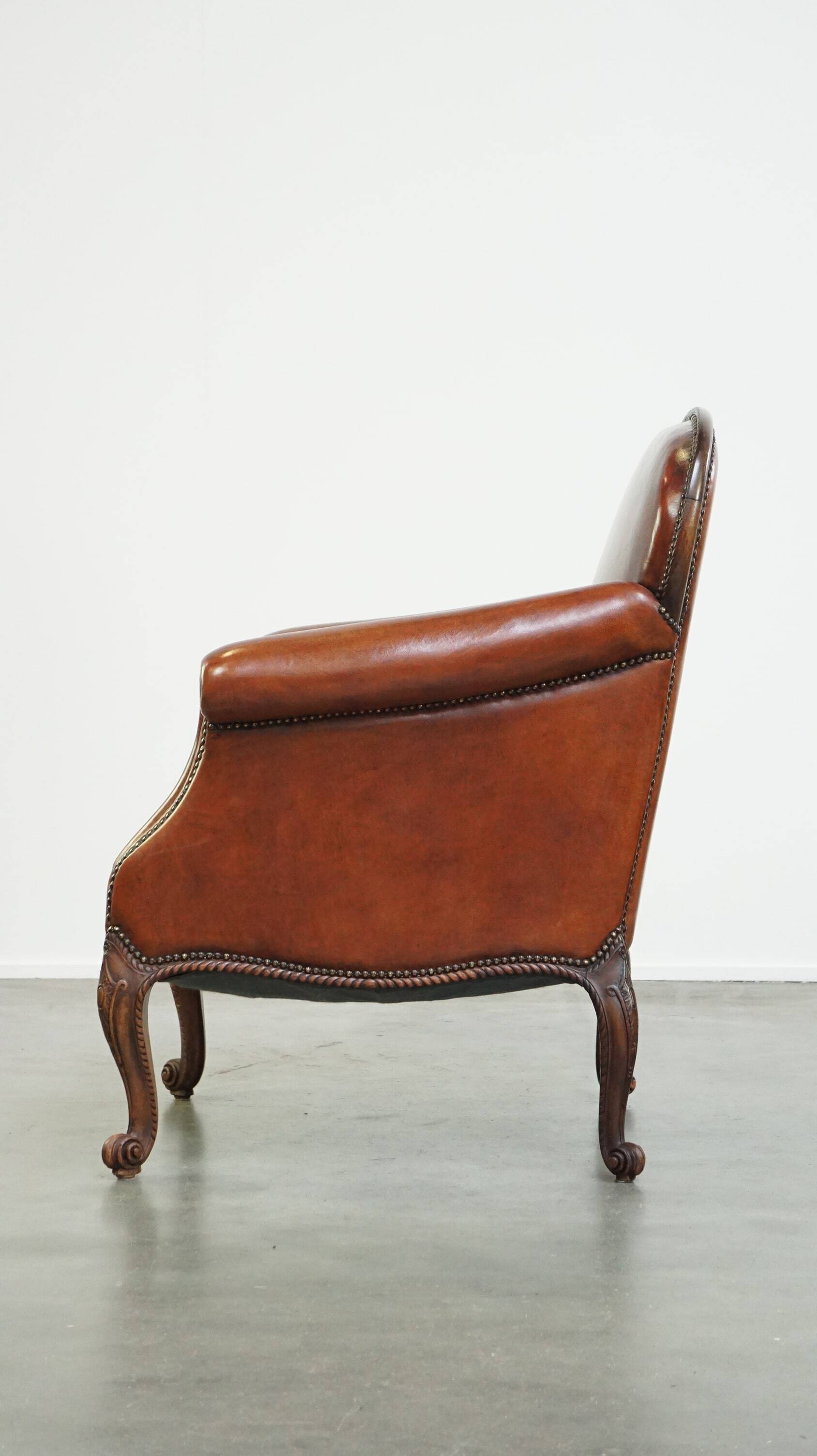 Fully restored antique sheepskin armchair