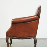 Fauteuil ancien en peau de mouton entièrement restauré