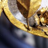 Old candlestick mirror gilded with leaf