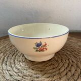 Flowery bowl with blue edging.