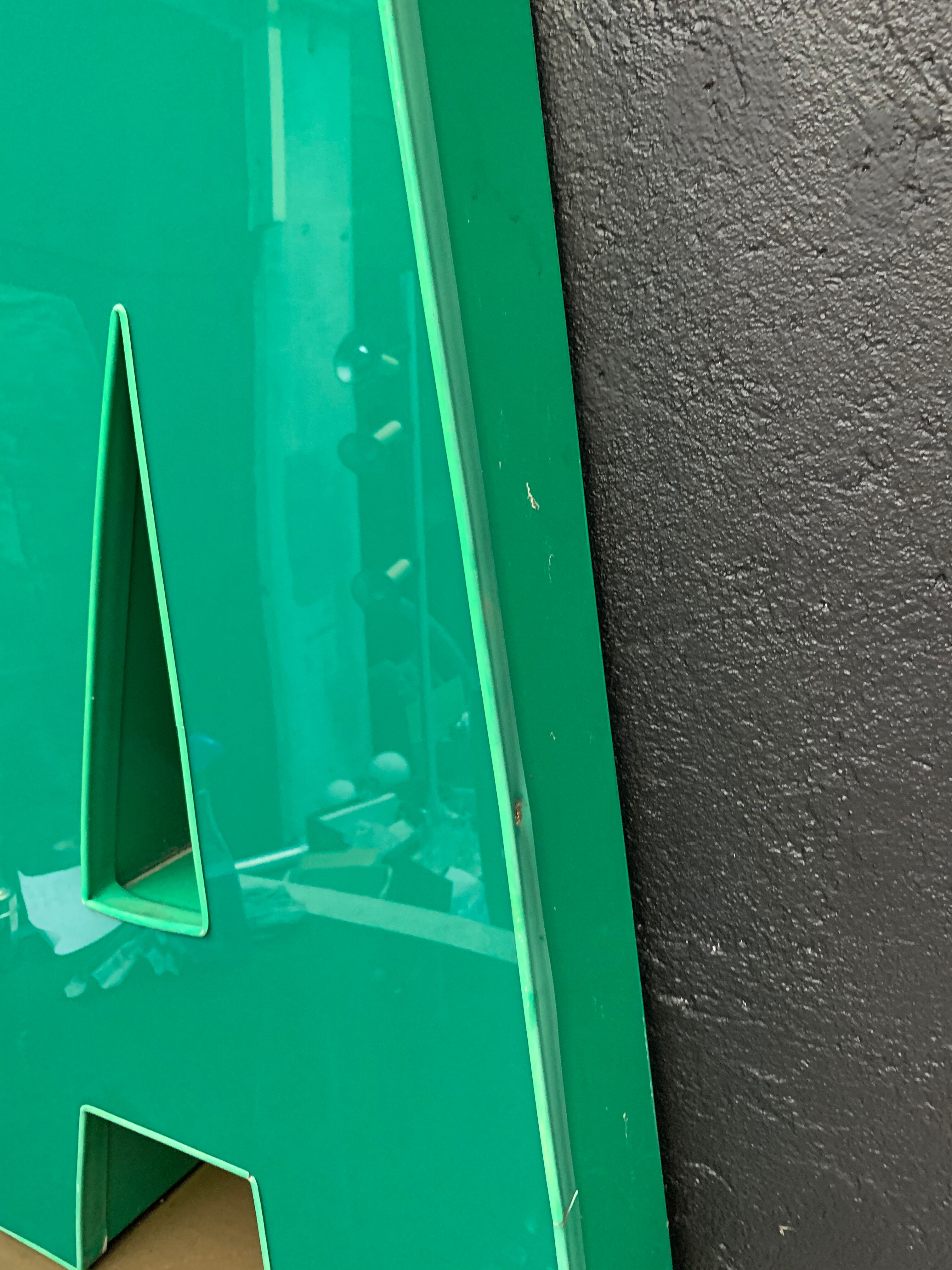 Old letter in metal and plexiglass, industrial decoration