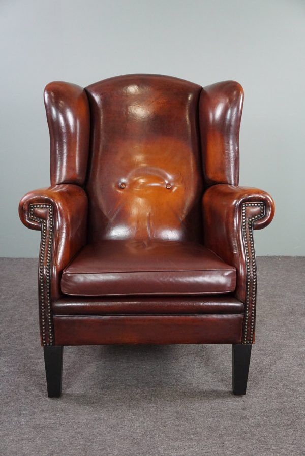 Patinated sheepskin armchair