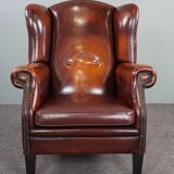 Patinated sheepskin armchair