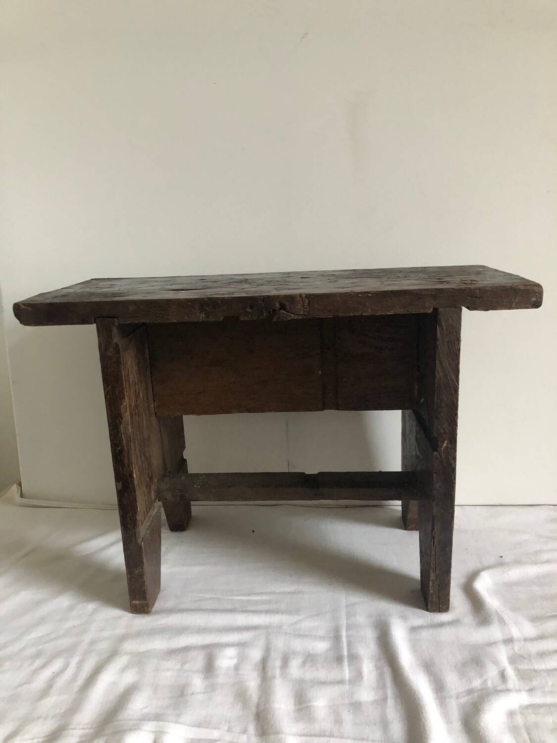 Small brutalist solid wood bench