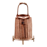 Wicker basket on wheels with leather flap