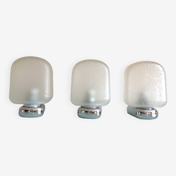 Suite of three wall lights in chrome metal and bubbled frosted glass/vintage 70s