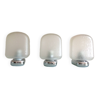 Suite of three wall lights in chrome metal and bubbled frosted glass/vintage 70s